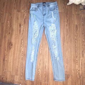PRETTY LITTLE THING DISTRESSED JEANS